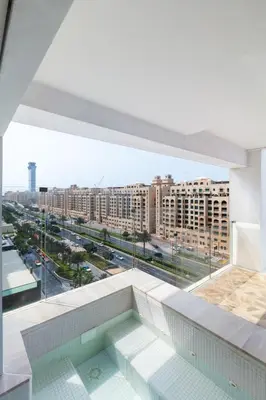a view of a city from the balcony of a building at Luxury 3BDR Apartment, Pool & Beach Access in Dubai
