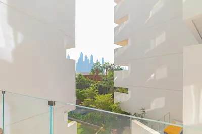 a view of the city from the balcony of a building at Luxury 3BDR Apartment, Pool & Beach Access in Dubai
