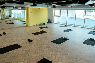 a room with a lot of yoga mats on the floor at Luxurious 3Bedroom Apartment in Dubai