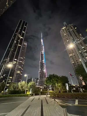 a view of the empire state building at night at Full Burj Khalifa & Fountain View All Rooms in Dubai