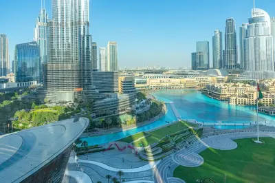 a view of a large city with tall buildings at Full Burj Khalifa & Fountain View All Rooms in Dubai