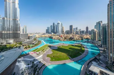 a view of a city with tall buildings at The View of a Lifetime - Luxury Living with Full Burj Khalifa & Fountain Show in Dubai