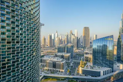 an aerial view of a city with tall buildings at 3 BHK Luxury Living at The Address Opera in Dubai