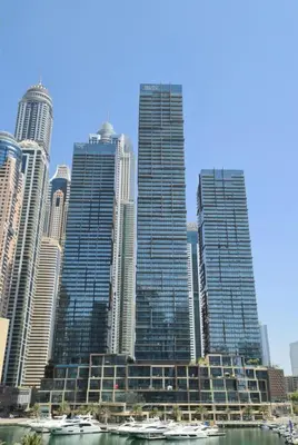 a group of tall buildings in a city at Cosy Apartment Marina Gate in Dubai