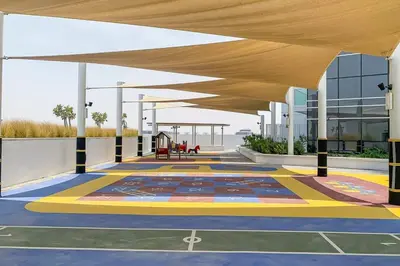 a building with a colorful carpeted floor and a building at Frank Porter - Damac Carson B in Dubai