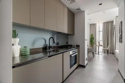 a kitchen with a sink and a counter top at GuestReady - Urban retreat at 15 Northside in Dubai