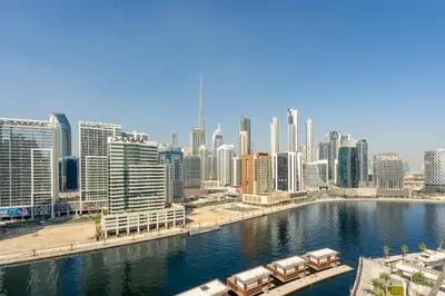 a view of a city with boats in the water at GuestReady - Urban retreat at 15 Northside in Dubai