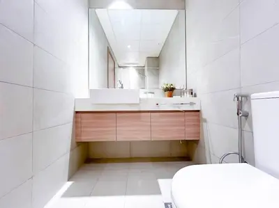 a bathroom with a sink and a mirror at Luxury Living in Azizi Riviera & Cozy Balcony in Dubai