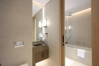 a bathroom with a sink and a mirror at Stunning 1BR with Marina View And Beach Access in Dubai