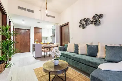 a living room with a couch and a table at Elegant 2 Bedroom in Business Bay with Burj View in Dubai