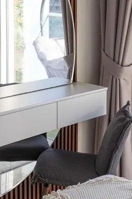 a white desk with a mirror next to a window at Burj Khalifa View 1 Bedroom Apartment With Balcony For Up To 4 Person in Dubai