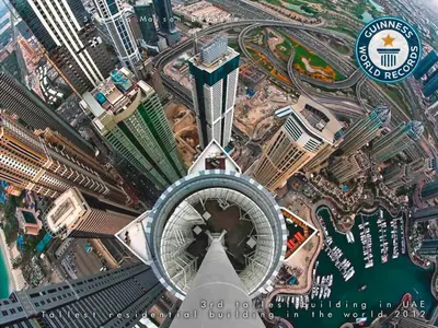 an aerial view of a large city with buildings at Huzz 59 - La Maison Blanche in Dubai