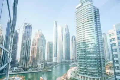 a view of a river in a city with tall buildings at The Nest by Beds & Company in Dubai