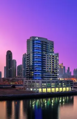 a large building with lights on in a city at damac maison canal view Luxuary 1BHK in heart downtow in Dubai