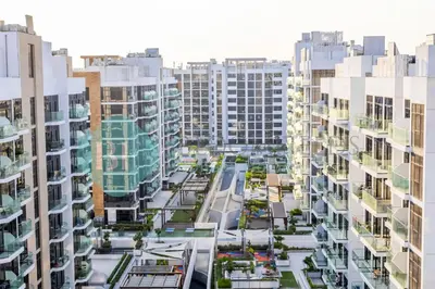 an aerial view of a city with tall buildings at Bloomfields Modern Stu In Azizi Riviera in Dubai