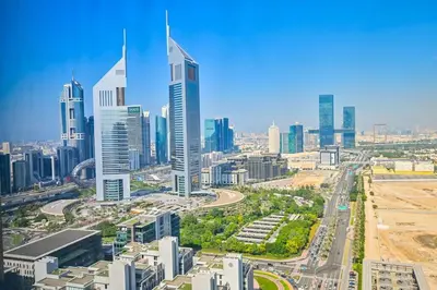 an aerial view of a city with tall buildings at Casa Bouclé An Urban sanctuary in DIFC 1BR in Dubai