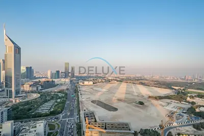 an aerial view of a city with a large airport at Lively Studio in Sky Gardens, DIFC by Deluxe Holiday Homes in Dubai