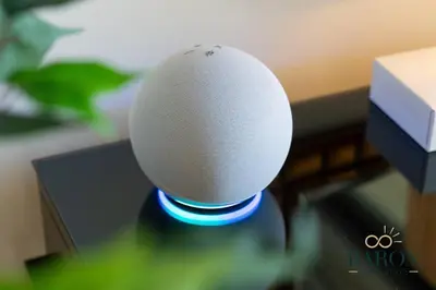 a wireless speaker sitting on top of a desk at The Modern in Dubai