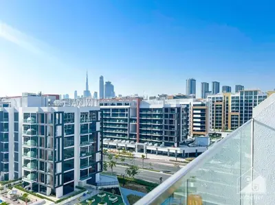 an aerial view of a city with tall buildings at Bright Studio in Azizi Riviera Perfect City Escape in Dubai