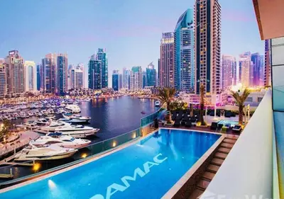 a view of a city skyline with a swimming pool at Dream Inn - Damac Heights Fendi in Dubai