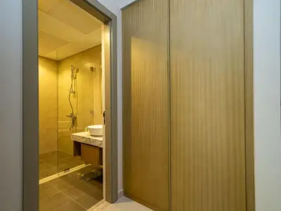 a bathroom with a shower and a sink at 50th Floor 2 Bed with Burj and Sea view in Dubai