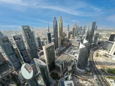 an aerial view of a city with tall buildings at Luxury 1-Bed DIFC Stay - City Views in a Prime Area in Dubai