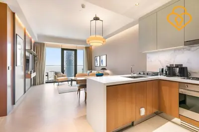 an open kitchen and living room with a dining room at Keysplease 2 BR Address Opera walking to Dubai Mall 55 in Dubai