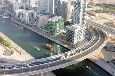an overhead view of a highway in a city with traffic at 1BHK with Marina Views and Beach Access in Dubai