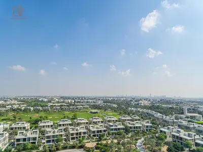 an aerial view of a city with apartment buildings at Stylish Apartment with Golf Views in Dubai Hills 199GV-2 in Dubai