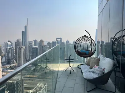 a balcony with a view of a city skyline at Dubai Marina stunning views holiday apartment Stella Maris Tower in Dubai