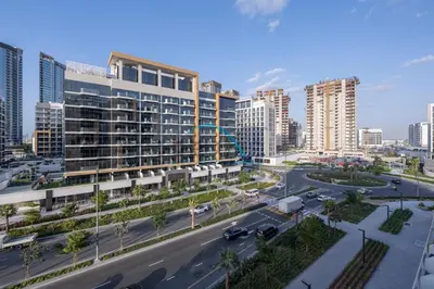 an aerial view of a city with tall buildings at Chic Studio in Azizi Riviera 46, Al Merkadh by Deluxe Holiday Homes in Dubai