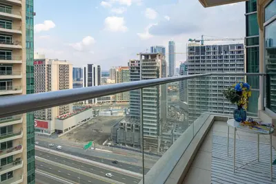 a balcony with a view of a city at Frank Porter - Burj Views West in Dubai