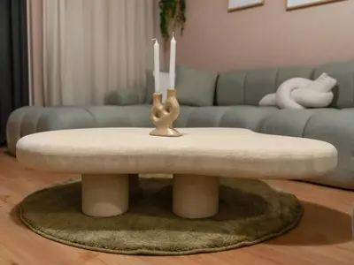 a living room with a table with two candles on it at Wabi-Sabi Style Fountain-View 4 BR Apt in the Sky in Dubai