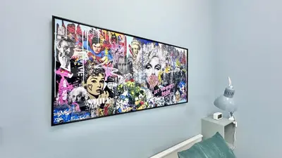 a flat screen tv hanging on a wall at Spacious Luxury Studio Near Mall of the Emirates with Pool Access in Dubai