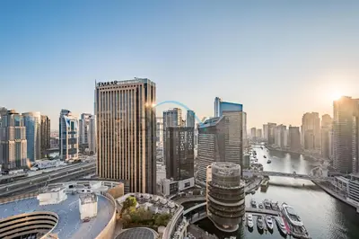 a view of a city with a river and buildings at Lovely Studio in The Address Residence Dubai Marina by Deluxe Holiday Homes in Dubai