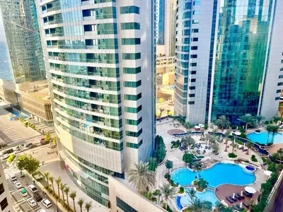 an aerial view of a city with tall buildings at One bedroom apartment available in Front of Marina Beach Dubai in Dubai