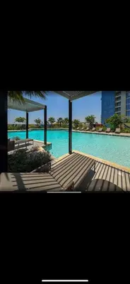 a view of a swimming pool with blue water at Samani vacation homes 3018 in Dubai