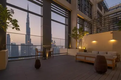 a living room with a view of the city at Urban Zen Sky Suite 1BR - Dubai Mall Access by Maxx Value homes in Dubai