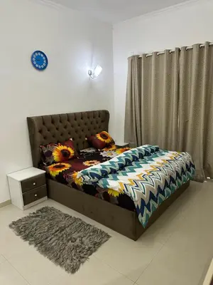 a bedroom with a bed and a curtain at Bedroom with attach bath and balcony in Marina Dubai in Dubai