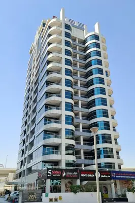 a large apartment building with many windows at Bedroom with attach bath and balcony in Marina Dubai in Dubai