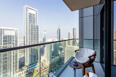 a room with a view of a city skyline at Brand New 1BR Apt in Grande Residence, Downtown Dubai - Allsopp & Allsopp in Dubai