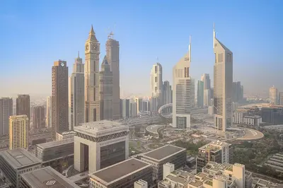 an aerial view of a large city with a clock tower at Silkhaus Sky Gardens at Homestyle Studio in DIFC in Dubai