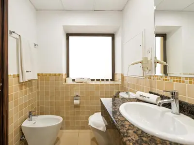 a bathroom with two sinks and a window at WonderfulStay At JBR - Luxury Dubai Eye View Living - Beach Access - Brand New Luxury Apartments in Dubai