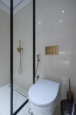 a bathroom with a toilet and a shower at Modern Studio, Burj Views - Business Travelers in Dubai