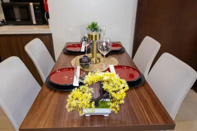 a wooden table with a wreath on top of it at japanDXB Burj Khalifa view - 4min Dubai Mall in Dubai
