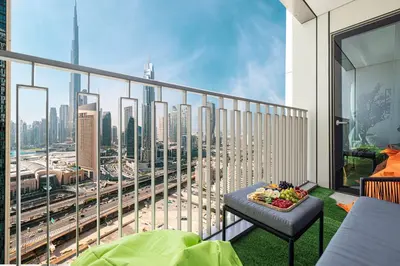 a balcony with a view of a city skyline at Full Burj view & Direct Access to Dubai Mall in Dubai