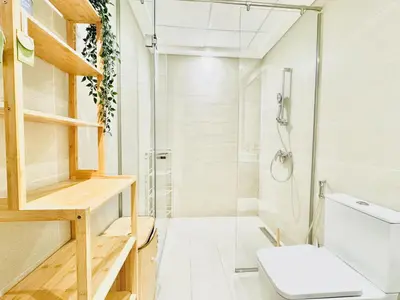 a bathroom with a toilet and a shower at Chic 1-BR in Azizi Riviera-Your Perfect Stay ! in Dubai