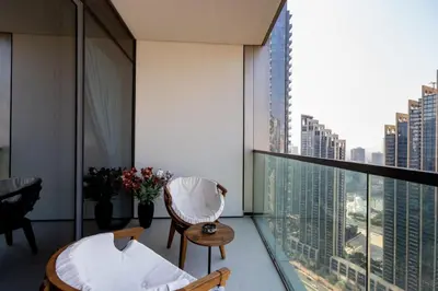 a hotel room with a view of a city at Near Burj Khalifa - 1BR Apartment in Grande Residence, Downtown - Allsopp & Allsopp in Dubai