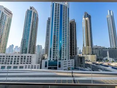 a view of a city with tall buildings at Upmarket Studio in Business Bay with a Gym and Pool in Dubai