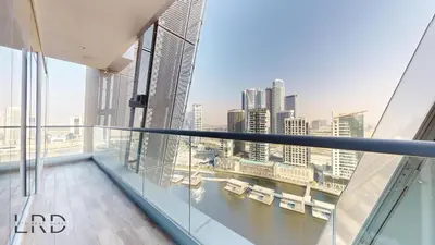 a view from the top of a building with a river at Stunning 2-Bed Apartment with Canal View in Dubai